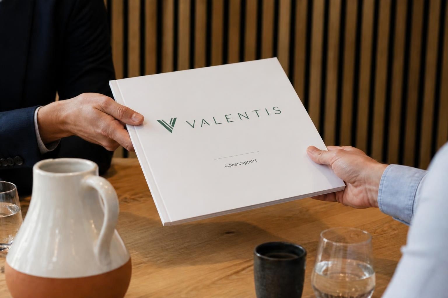 The Valentis Advisory Report is handed across the table